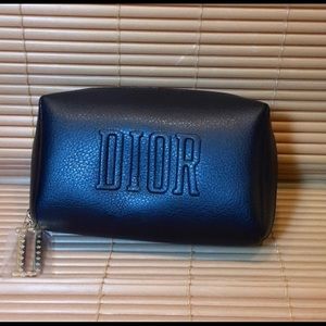 DIOR Bag has never been used and still plastic covering on the zipper.